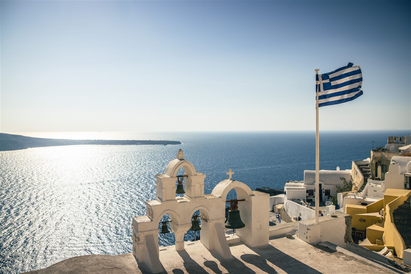 Greek flag over Santorini
